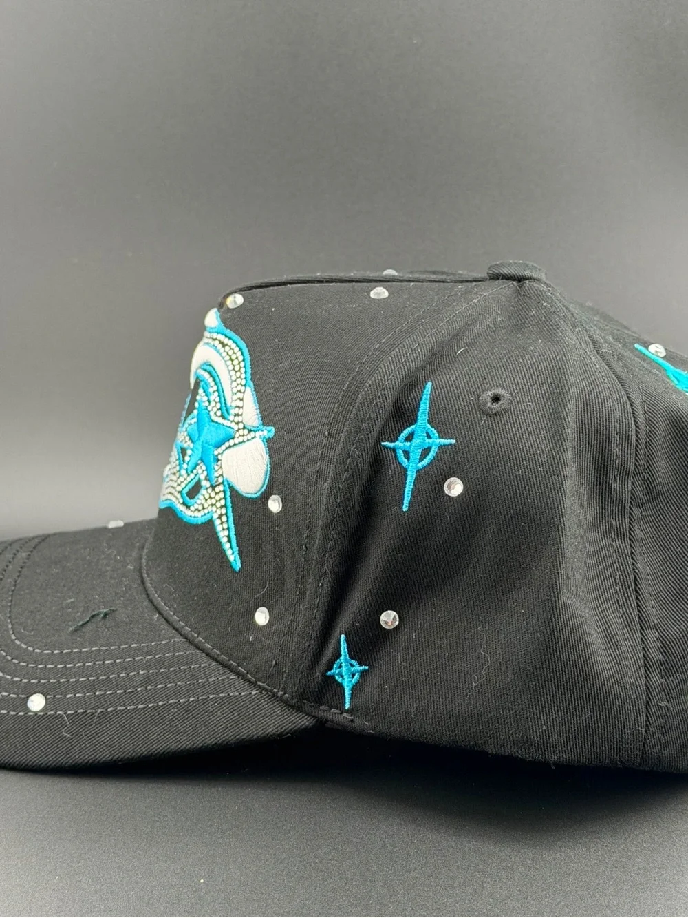 Black Baseball Cap with Blue & White Star Accent